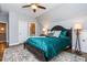 Cozy bedroom with dark furniture, ceiling fan, and a comfortable rug at 1282 Kendrick Ne Rd, Brookhaven, GA 30319