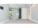 Spacious bedroom features light blue walls, carpet, closet, and natural light from bright windows at 1282 Kendrick Ne Rd, Brookhaven, GA 30319