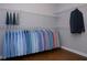 Organized closet with hanging rods for shirts and jackets, providing efficient storage at 1282 Kendrick Ne Rd, Brookhaven, GA 30319