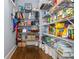 Walk-in pantry with custom shelving providing ample storage space for food and kitchen essentials at 1282 Kendrick Ne Rd, Brookhaven, GA 30319