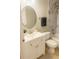 Bathroom features a vanity with sink, toilet, and a shower-tub combination at 5581 Marbut Rd, Lithonia, GA 30058