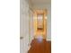 Hallway with tile floor and access to the front door at 5581 Marbut Rd, Lithonia, GA 30058
