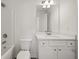 Bathroom featuring a shower/tub combination with all white fixtures and a white vanity at 1313 Pj East Rd, Covington, GA 30014