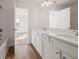 A new bathroom features a double sink vanity and bathtub at 1313 Pj East Rd, Covington, GA 30014