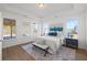 Bedroom with tray ceiling, natural light, and modern decor at 1313 Pj East Rd, Covington, GA 30014