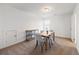 Upstairs dining room offers carpet flooring and neutral walls at 1313 Pj East Rd, Covington, GA 30014