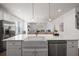 Stylish eat-in kitchen with stainless appliances, a large island, and an open floor plan at 1313 Pj East Rd, Covington, GA 30014