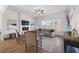 Bright living room with fireplace, comfortable seating, and large windows at 1313 Pj East Rd, Covington, GA 30014