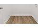 Empty room with hardwood floors and white walls at 1313 Pj East Rd, Covington, GA 30014