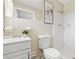 Bright bathroom with a clean vanity, toilet, mirror, and a standing shower at 190 Judy Sw Ln, Atlanta, GA 30315