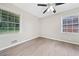 Bright bedroom with wood-look floors, neutral walls, and a ceiling fan at 190 Judy Sw Ln, Atlanta, GA 30315