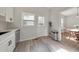 Bright and airy kitchen featuring new appliances, countertops and access to the dining area at 222 Bishop Ne Dr, Marietta, GA 30060