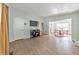 Open-concept living room flowing into the dining area, featuring hardwood floors at 222 Bishop Ne Dr, Marietta, GA 30060