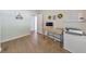Bright, airy office space with a desk, printer, and decor on a white painted wall at 222 Bishop Ne Dr, Marietta, GA 30060