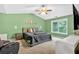 Spacious bedroom with tray ceilings, ceiling fan, and large window for natural light at 2263 Nottley Dr # 2, Marietta, GA 30066