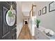 Bright entryway with hardwood floors, staircase, and views into the living area at 2263 Nottley Dr # 2, Marietta, GA 30066