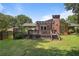 Charming backyard with a deck and a well-manicured lawn, perfect for outdoor living at 476 Concord Se Ln, Smyrna, GA 30082