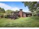 Spacious backyard with a deck and a well-maintained lawn, perfect for outdoor activities at 476 Concord Se Ln, Smyrna, GA 30082