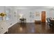 Bright living room featuring beautiful hardwood floors and a cozy sitting area at 476 Concord Se Ln, Smyrna, GA 30082