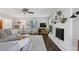 Bright living room featuring a fireplace, hardwood floors, and recessed lighting at 476 Concord Se Ln, Smyrna, GA 30082