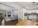 Modern living space with open layout between kitchen and living room at 476 Concord Se Ln, Smyrna, GA 30082