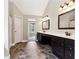 Bathroom boasts dual sinks, tiled floors, and an open layout to the bedroom area at 6298 Gothards Ln, Douglasville, GA 30134