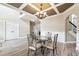 Spacious dining room with decorative ceiling, chandelier, and an open floor plan at 6298 Gothards Ln, Douglasville, GA 30134