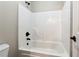 Bright bathroom with a shower and a toilet, all in a clean, white setting at 6298 Gothards Ln, Douglasville, GA 30134
