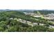 Aerial view of community surrounded by lush greenery and city backdrop at 88 Timber Ridge Dr, Cartersville, GA 30121