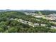 Aerial view of community surrounded by lush greenery and city backdrop at 88 Timber Ridge Dr, Cartersville, GA 30121