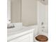 Bright bathroom featuring white sink and cabinet with a wood toilet seat at 88 Timber Ridge Dr, Cartersville, GA 30121