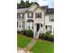 Charming townhome with manicured lawn and inviting entrance at 88 Timber Ridge Dr, Cartersville, GA 30121