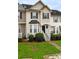 Charming townhome featuring manicured lawn and inviting entrance at 88 Timber Ridge Dr, Cartersville, GA 30121