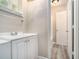Functional bathroom with a vanity sink and a view into the toilet and shower at 114 Howell Sw Dr, Atlanta, GA 30331
