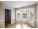 Dining area with a bay window that provides ample natural light at 1403 W Prospect Dr, Lawrenceville, GA 30043