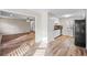 Open concept kitchen with modern appliances and wood floors at 1403 W Prospect Dr, Lawrenceville, GA 30043