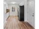 The kitchen features white cabinets, stainless appliances, and ample counter space at 1403 W Prospect Dr, Lawrenceville, GA 30043