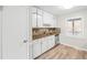 Bright kitchen with stainless steel appliances and mosaic backsplash at 1403 W Prospect Dr, Lawrenceville, GA 30043