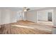 Inviting living room showcasing wood floors and a view of the home's entry at 1403 W Prospect Dr, Lawrenceville, GA 30043