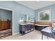 Elegant bathroom features double vanity, freestanding tub, and bright natural light at 639 Hall Station Rd, Kingston, GA 30145