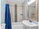 Bathroom with a classic design, including a tub, tiled walls and a curtain at 639 Hall Station Rd, Kingston, GA 30145