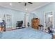 Spacious bedroom with cool wall color, modern furniture, and lots of natural light at 639 Hall Station Rd, Kingston, GA 30145