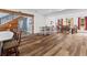 Open concept dining area featuring beautiful floors and staircase at 639 Hall Station Rd, Kingston, GA 30145