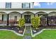 Inviting front entrance with a stone path, lush landscaping, and charming details at 639 Hall Station Rd, Kingston, GA 30145