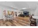 Spacious open-concept living and dining area with hardwood floors and ample natural light at 639 Hall Station Rd, Kingston, GA 30145