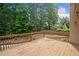 Spacious deck with wooden railings, perfect for outdoor entertaining and relaxation at 9996 Village South Dr, Douglasville, GA 30135