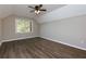 Bright bedroom with hardwood floors and vaulted ceiling at 216 Hickory Way, Canton, GA 30115
