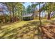 Beautiful view of the home exterior with a sprawling yard at 216 Hickory Way, Canton, GA 30115