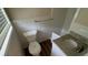 Cozy bathroom features a tile shower and a white vanity with granite counters at 2292 Country Club Sw Ln, Atlanta, GA 30311