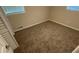 Bedroom with neutral paint, carpet and trim plus a window and closet at 2292 Country Club Sw Ln, Atlanta, GA 30311
